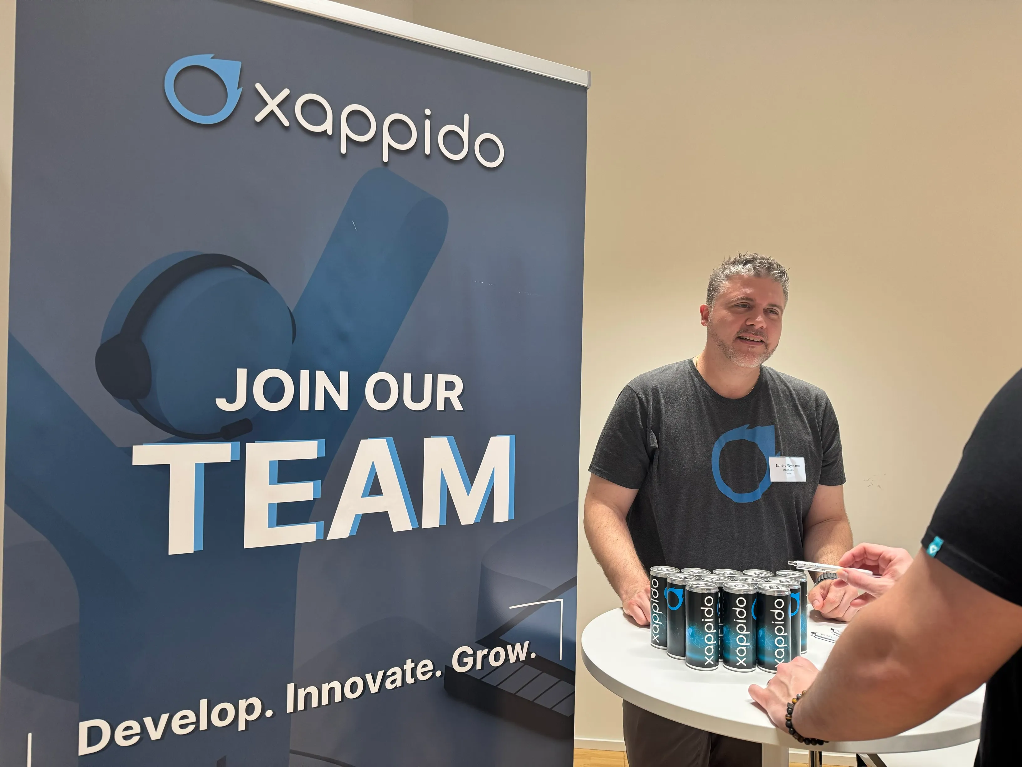 Der xappido-Stand mit dem Banner «Join our Team»